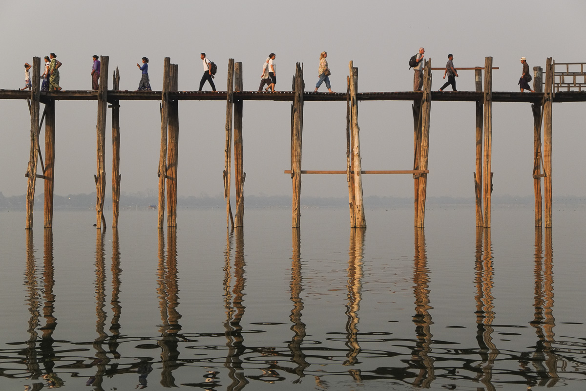 U bein bridge people crossing